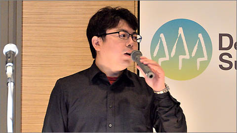 日本マイクロソフトの長沢智治氏。「エンタープライズでは、むしろビジネスニーズからDevOpsがきている」「エンタープライズはITインフラ側が非常に成熟しており、システム運用自動化の下地ができている可能性がある。そこにアプリの自動化が取り込まれていくのでは」